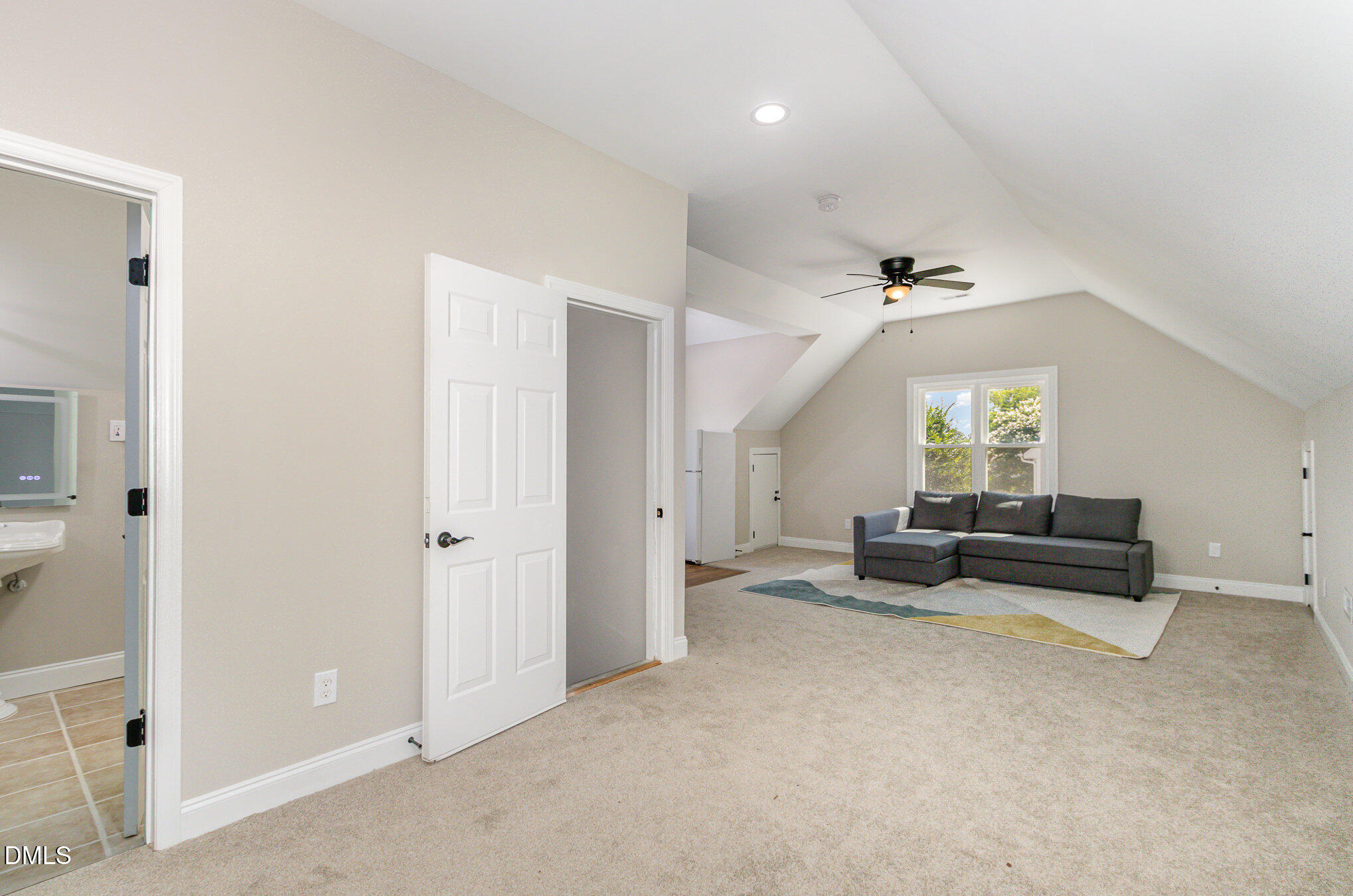 2324 Dahlgreen Road Raleigh, NC 27615 - Photo 14 of 21 an empty room with windows and wooden walls