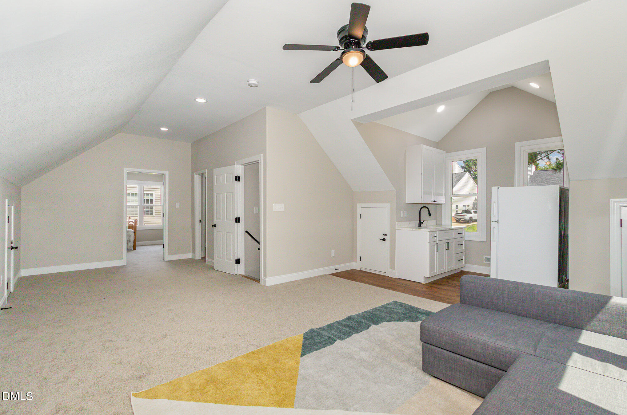 2324 Dahlgreen Road Raleigh, NC 27615 - Photo 15 of 21 a living room with furniture and a ceiling fan