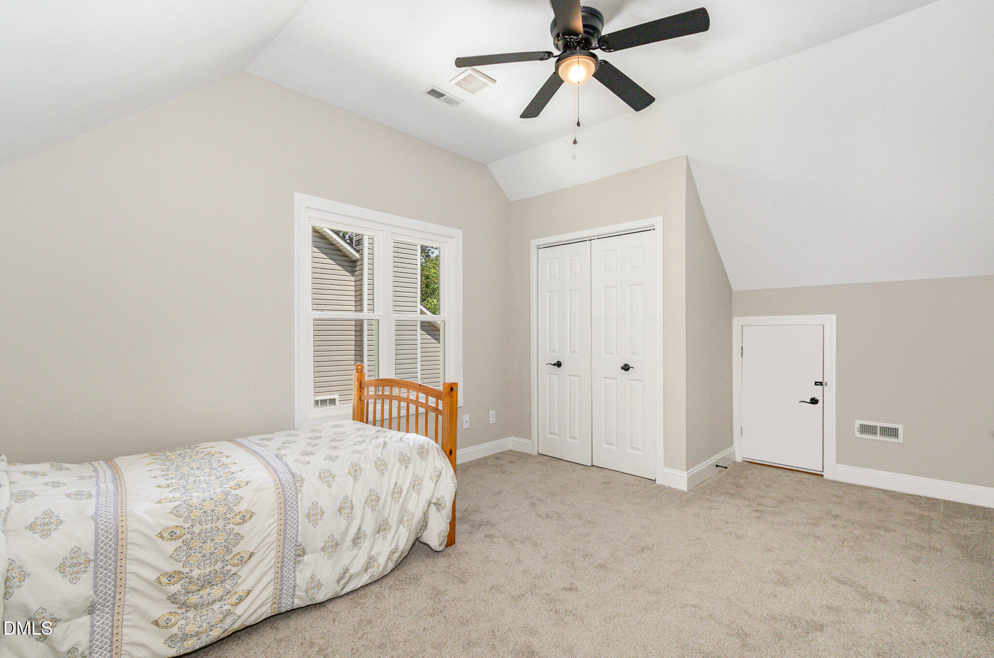 2324 Dahlgreen Road Raleigh, NC 27615 - Photo 16 of 21 a bedroom with a bed and a window