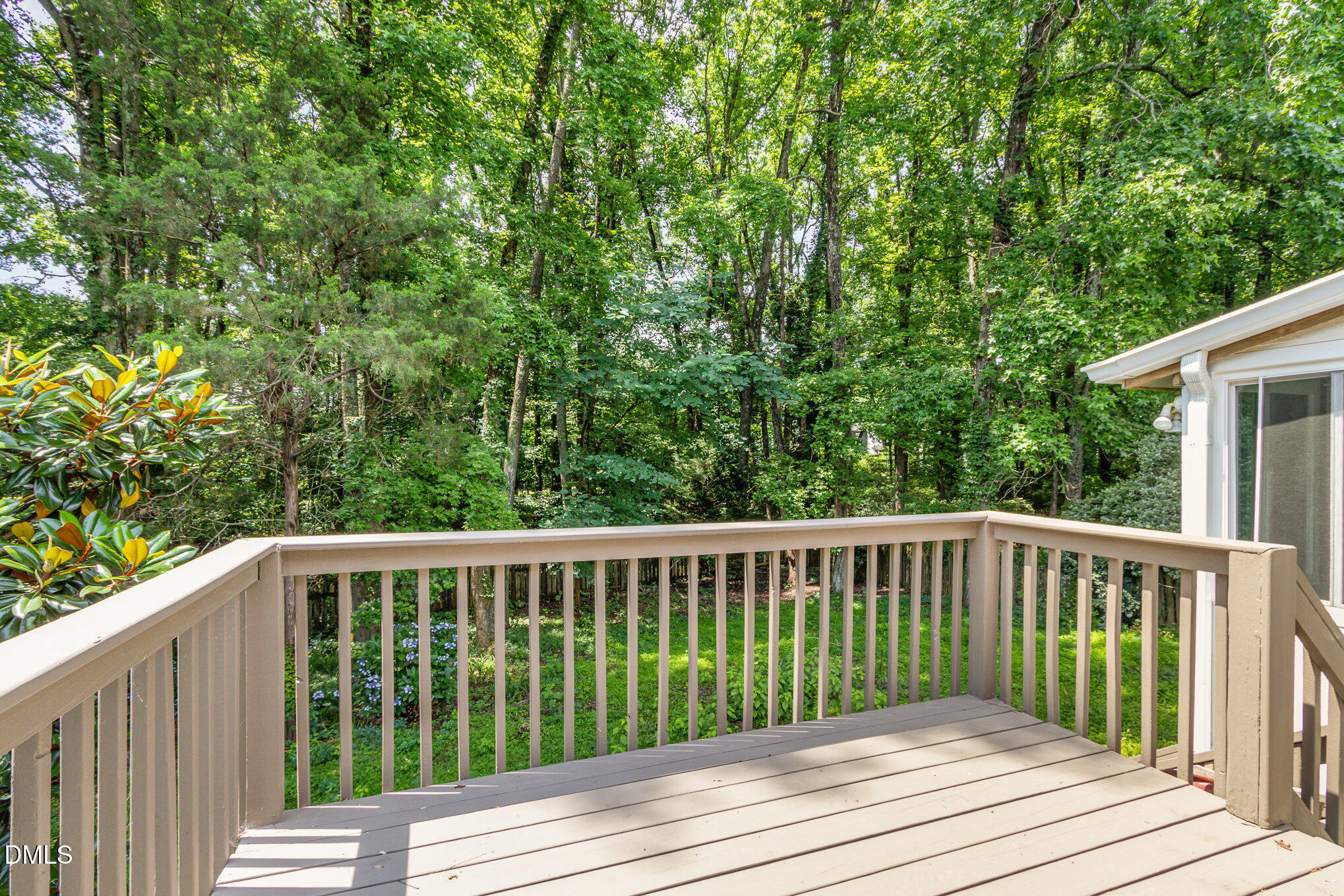 2324 Dahlgreen Road Raleigh, NC 27615 - Photo 18 of 21 a balcony with wooden floor and fence
