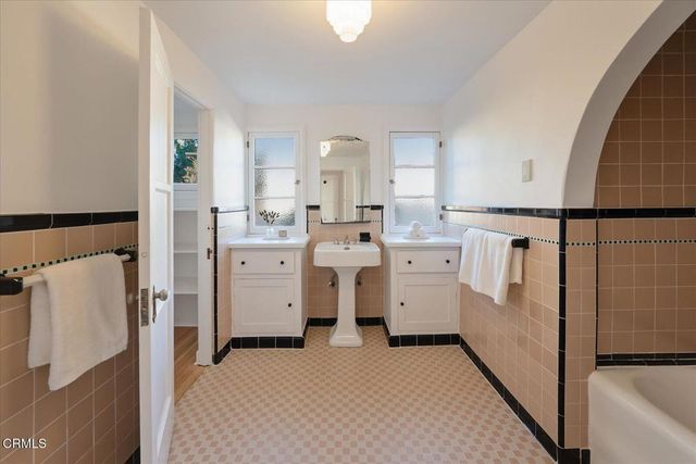 a swimming pool with outdoor seating and yard