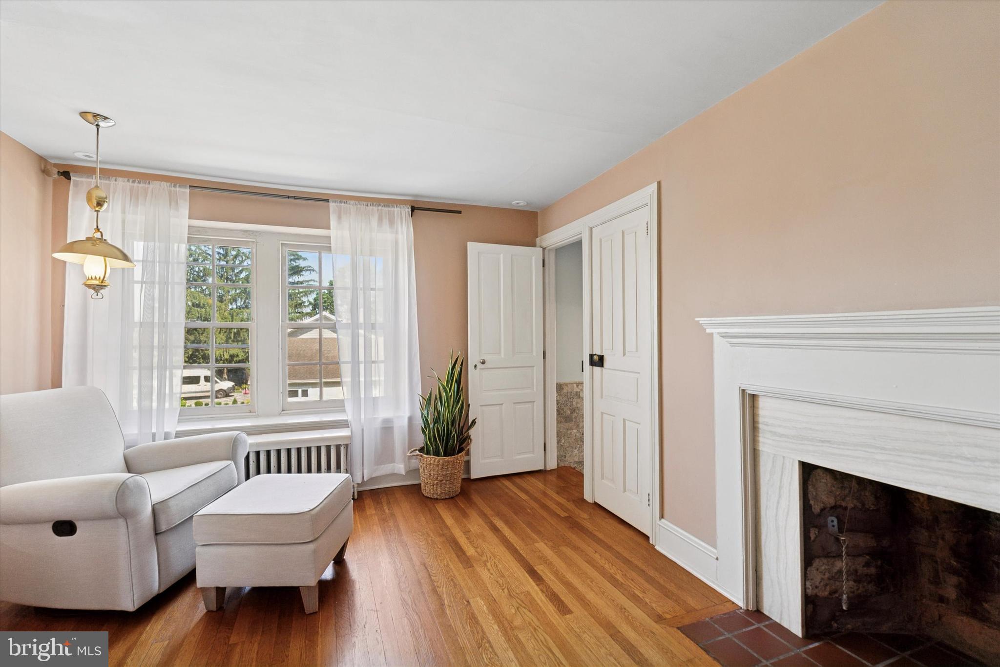 301 East Moreland Road Willow Grove, PA 19090 - Photo 12 of 21 a view of a livingroom with furniture and a fireplace