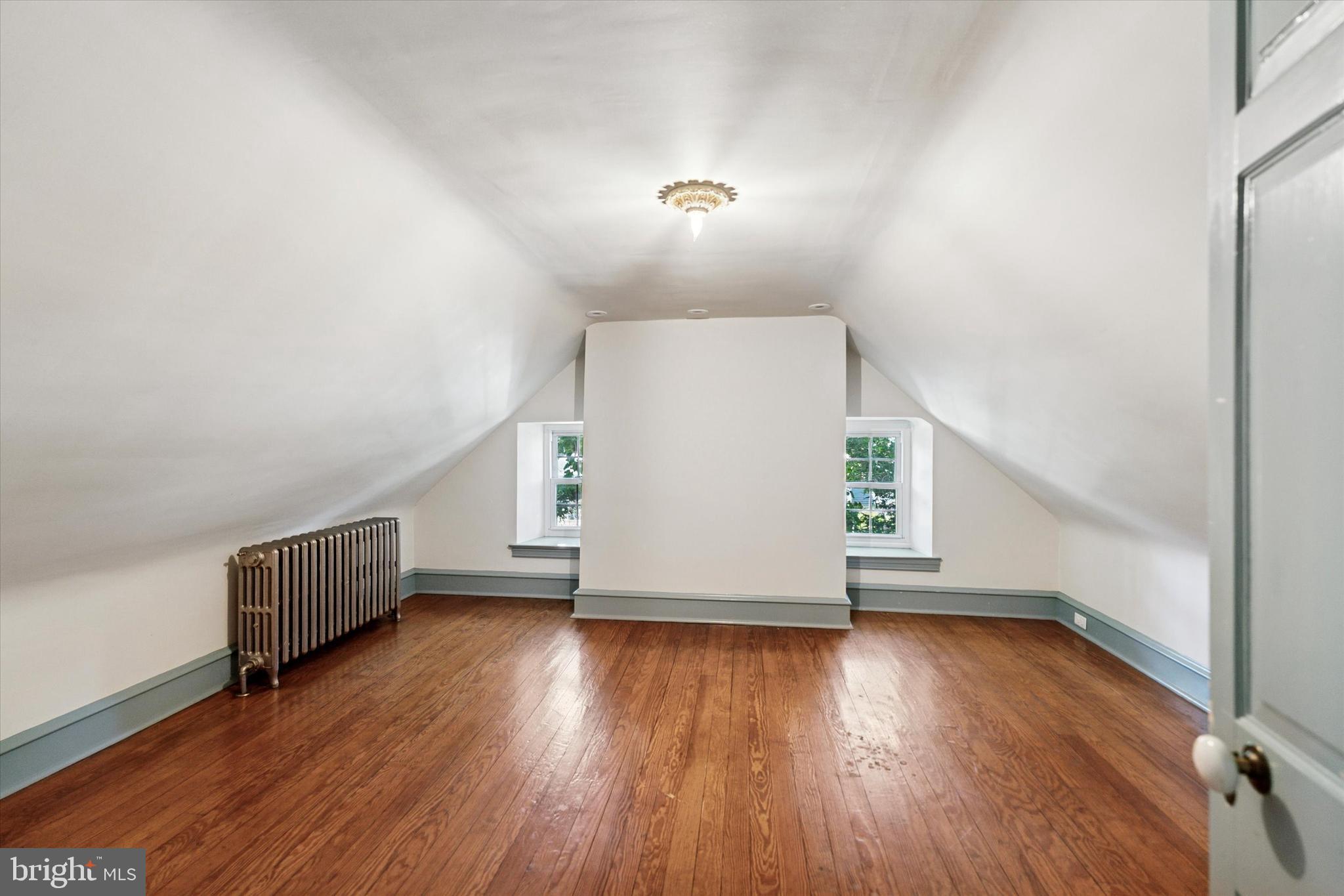 301 East Moreland Road Willow Grove, PA 19090 - Photo 14 of 21 wooden floor in an empty room with a window