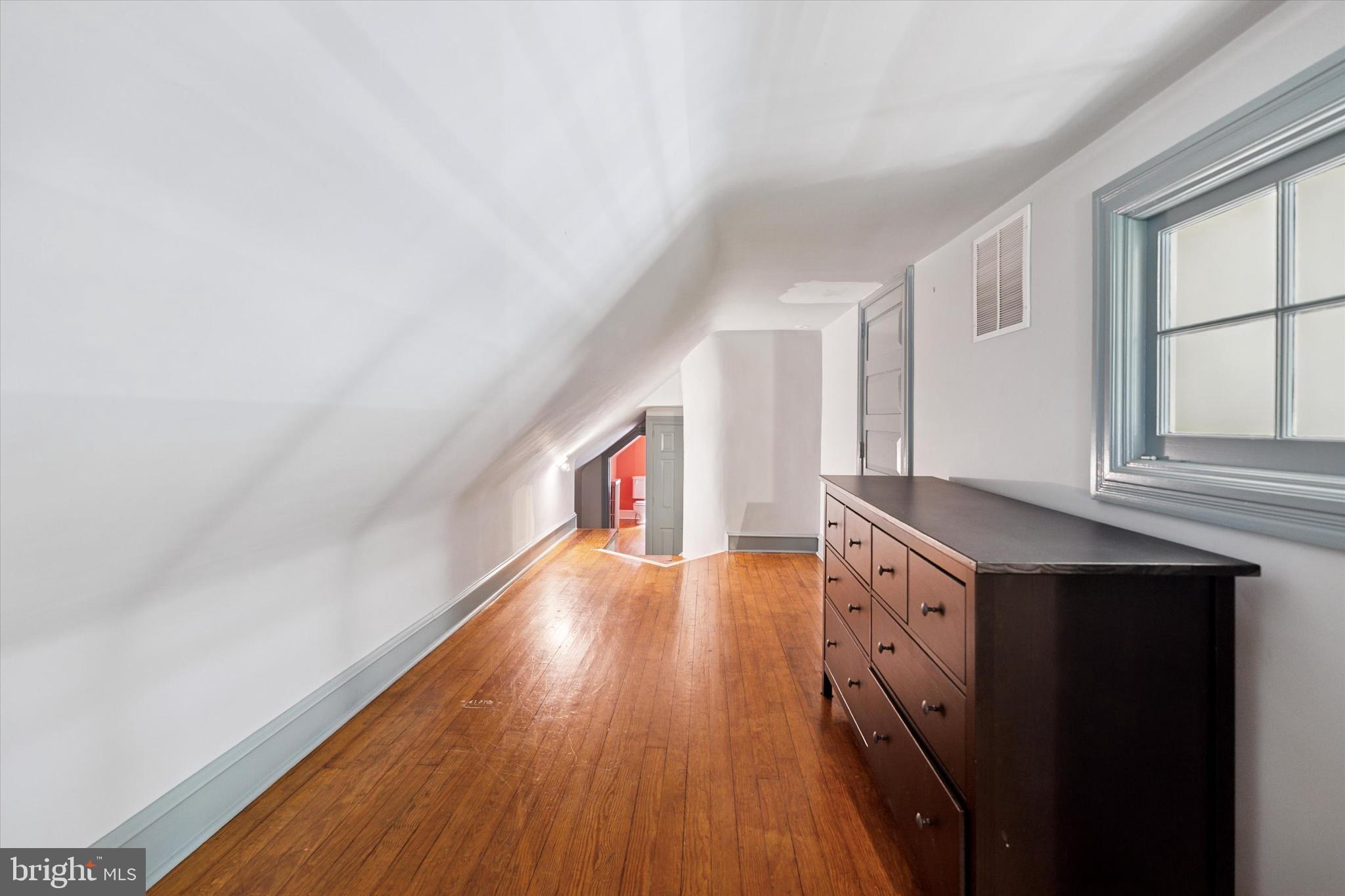 301 East Moreland Road Willow Grove, PA 19090 - Photo 15 of 21 wooden floor in an empty room with a window