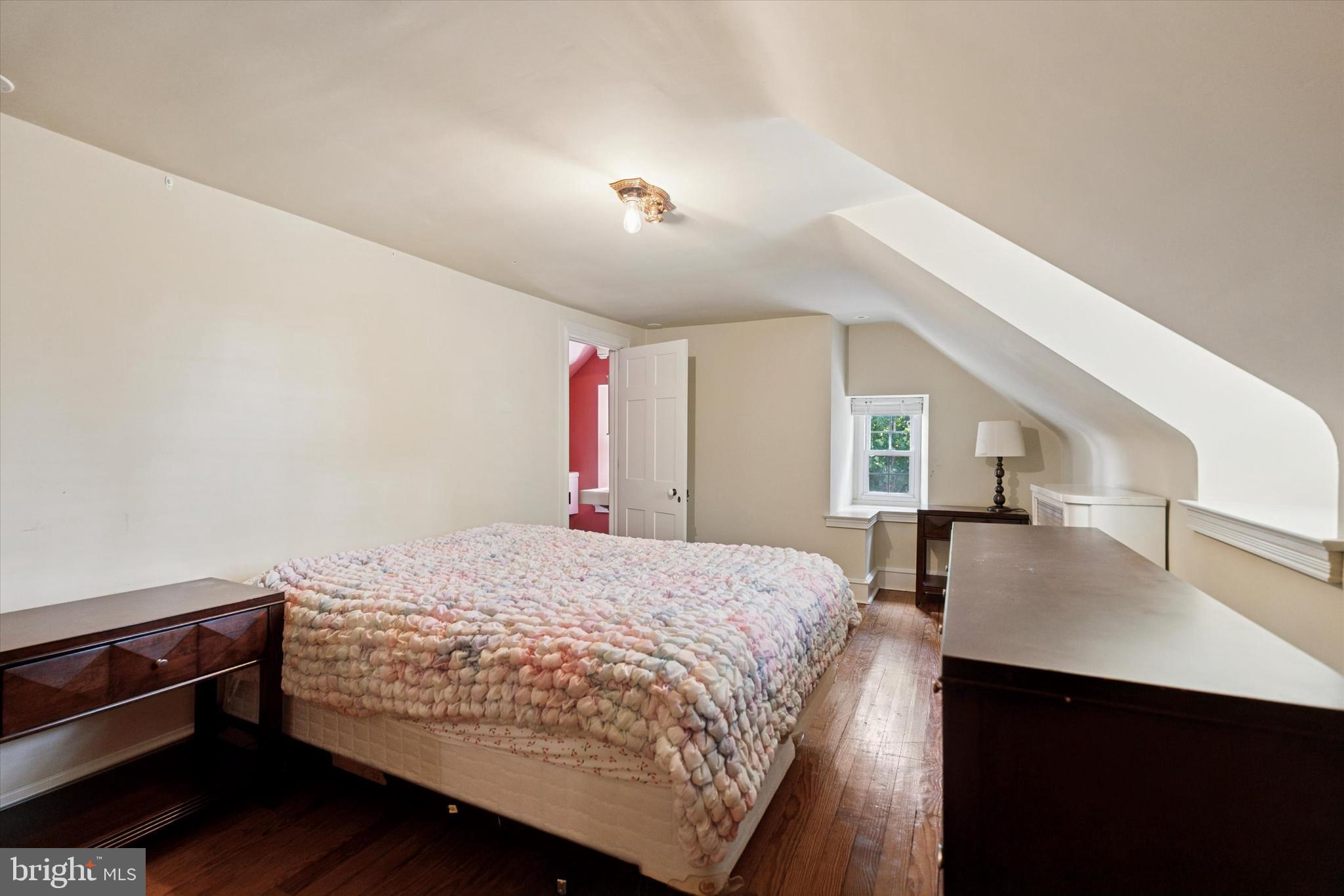 301 East Moreland Road Willow Grove, PA 19090 - Photo 16 of 21 a bedroom with a bed and a dresser with wooden floor