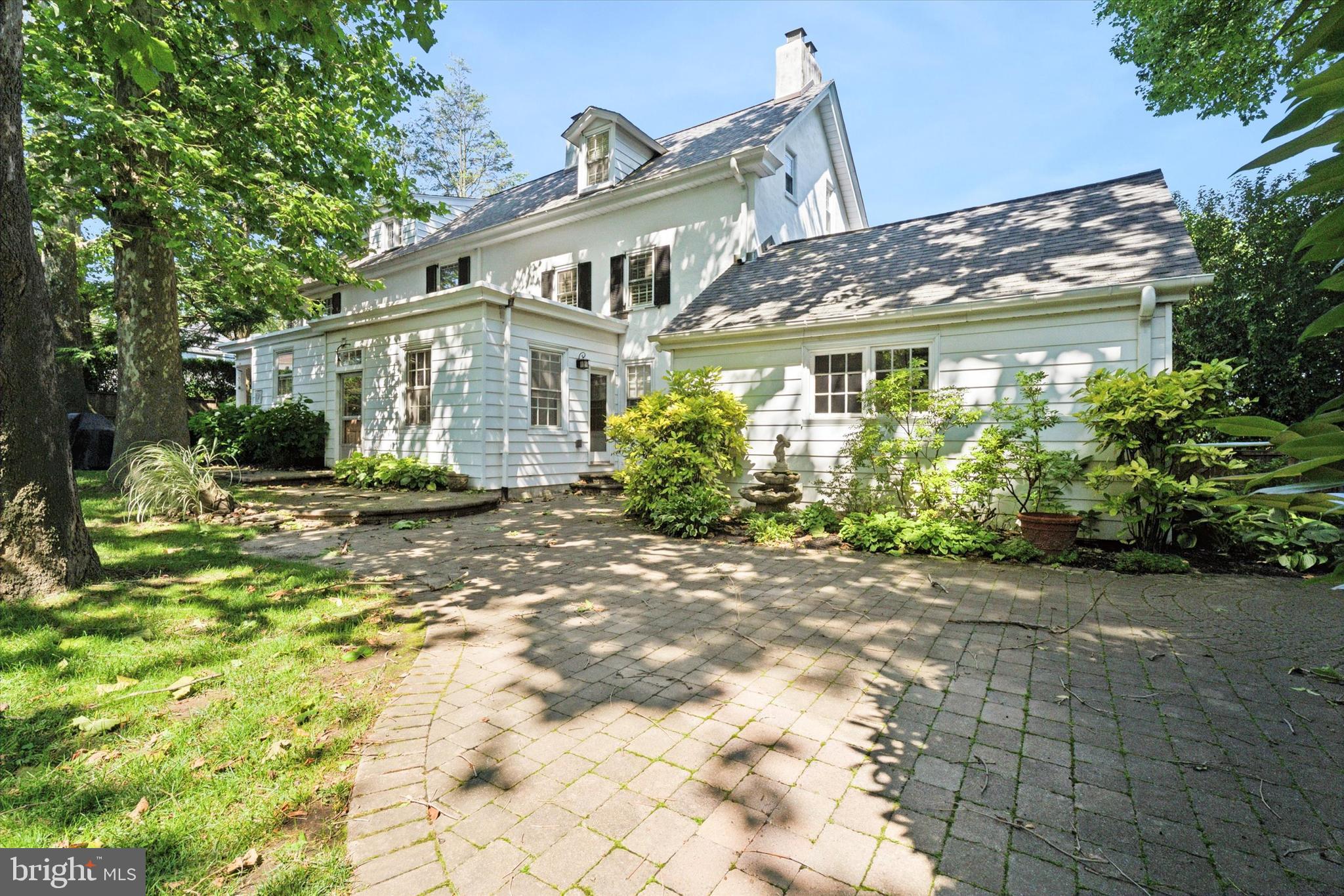 301 East Moreland Road Willow Grove, PA 19090 - Photo 19 of 21 a front view of a house with garden