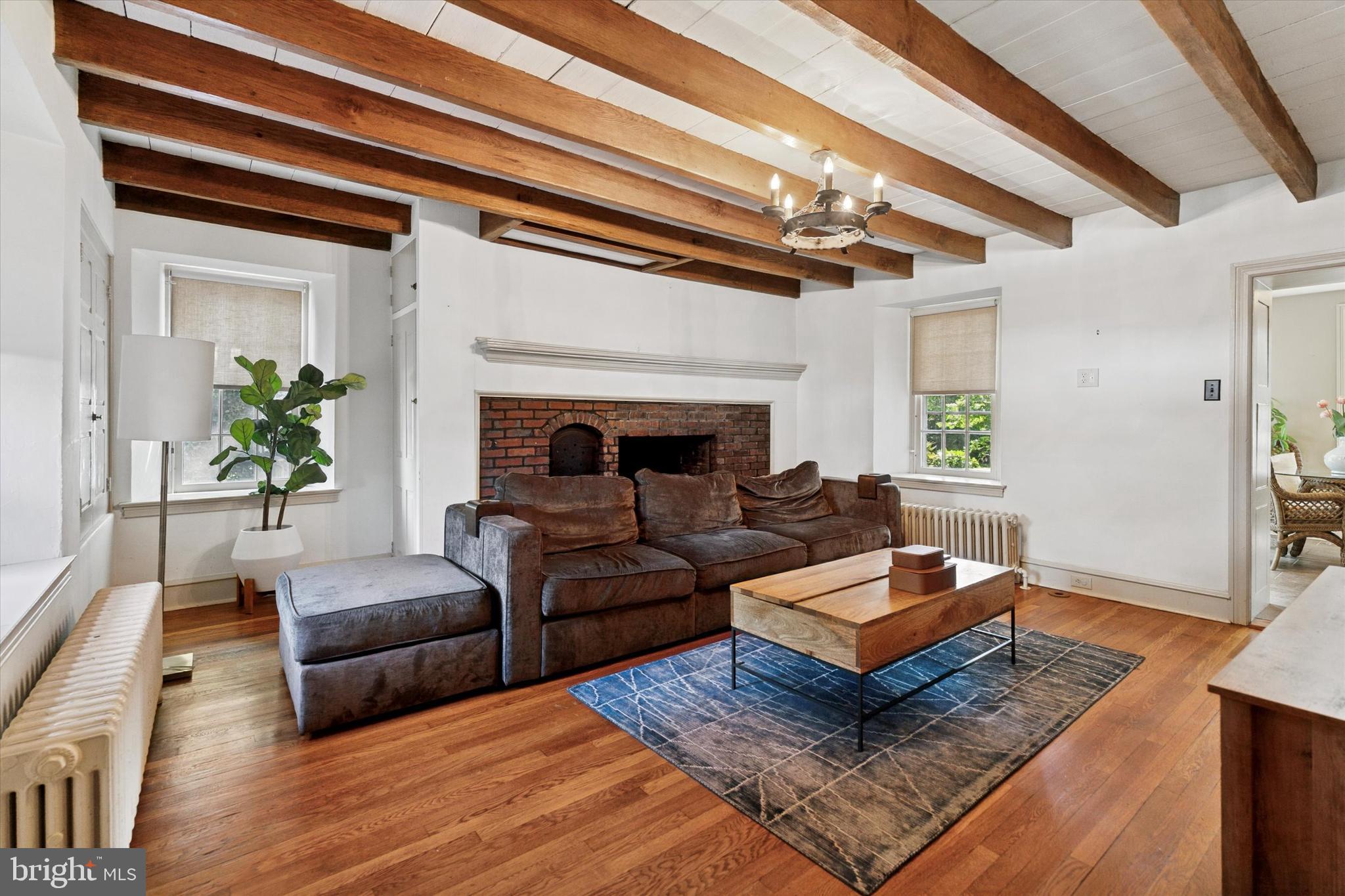 301 East Moreland Road Willow Grove, PA 19090 - Photo 6 of 21 a living room with furniture and a fireplace