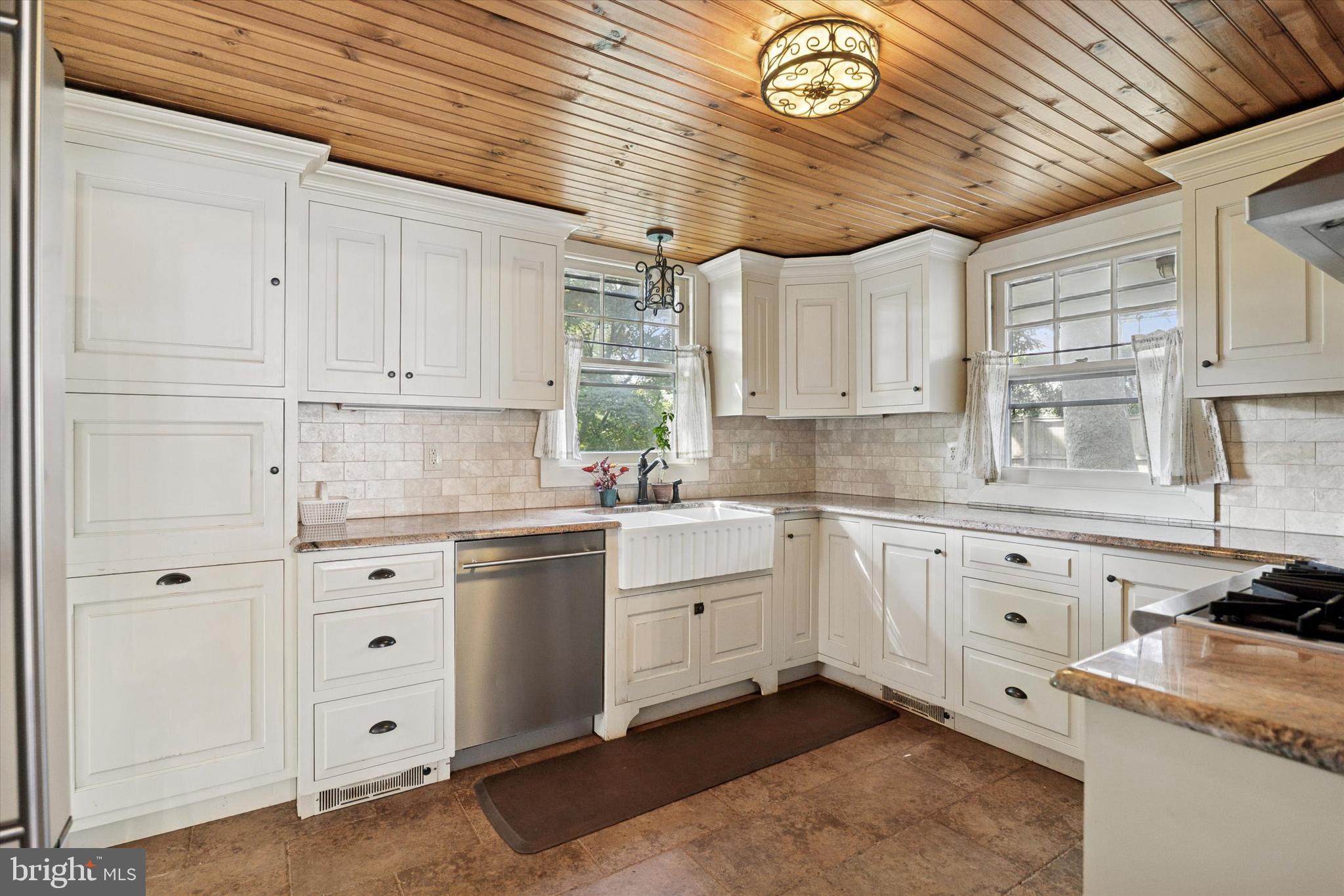 301 East Moreland Road Willow Grove, PA 19090 - Photo 9 of 21 a kitchen with granite countertop white cabinets and white appliances
