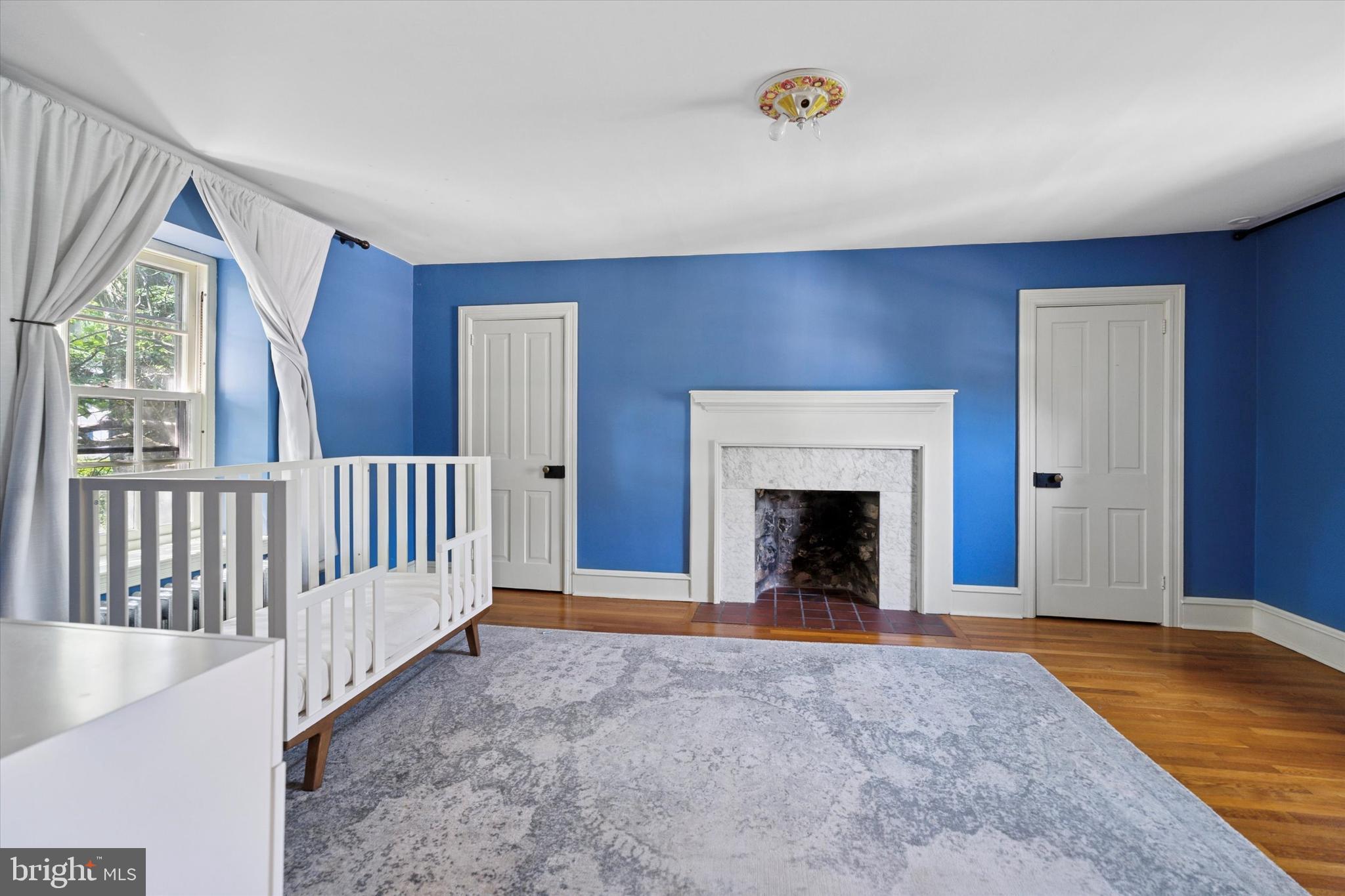 301 East Moreland Road Willow Grove, PA 19090 - Photo 10 of 21 a view of a livingroom with a fireplace and balcony