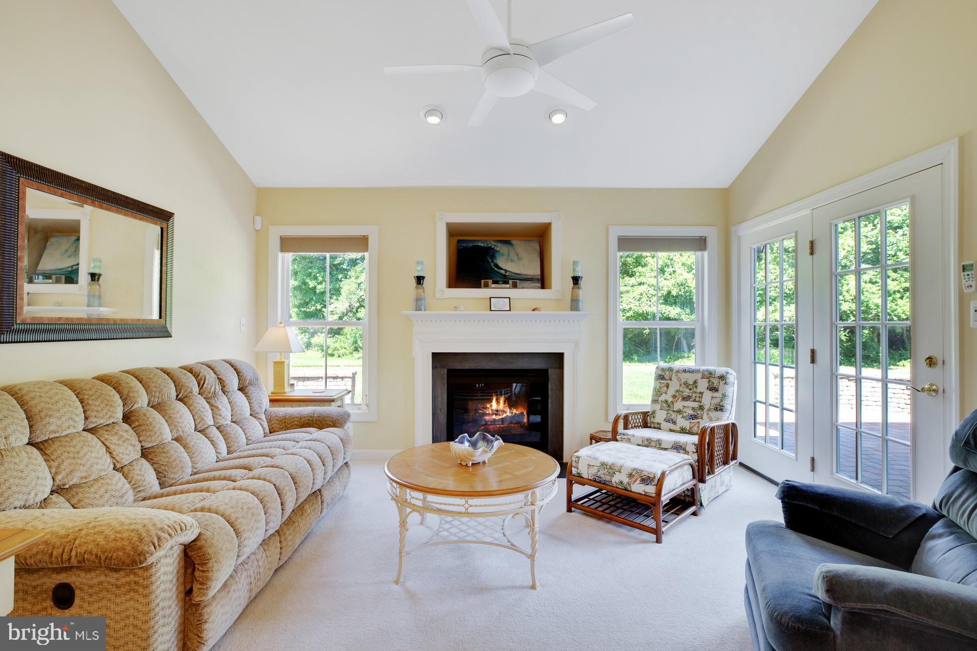 30907 Starling Road Ocean View, DE 19970 - Photo 14 of 33 Family room with fireplace and plenty of light!