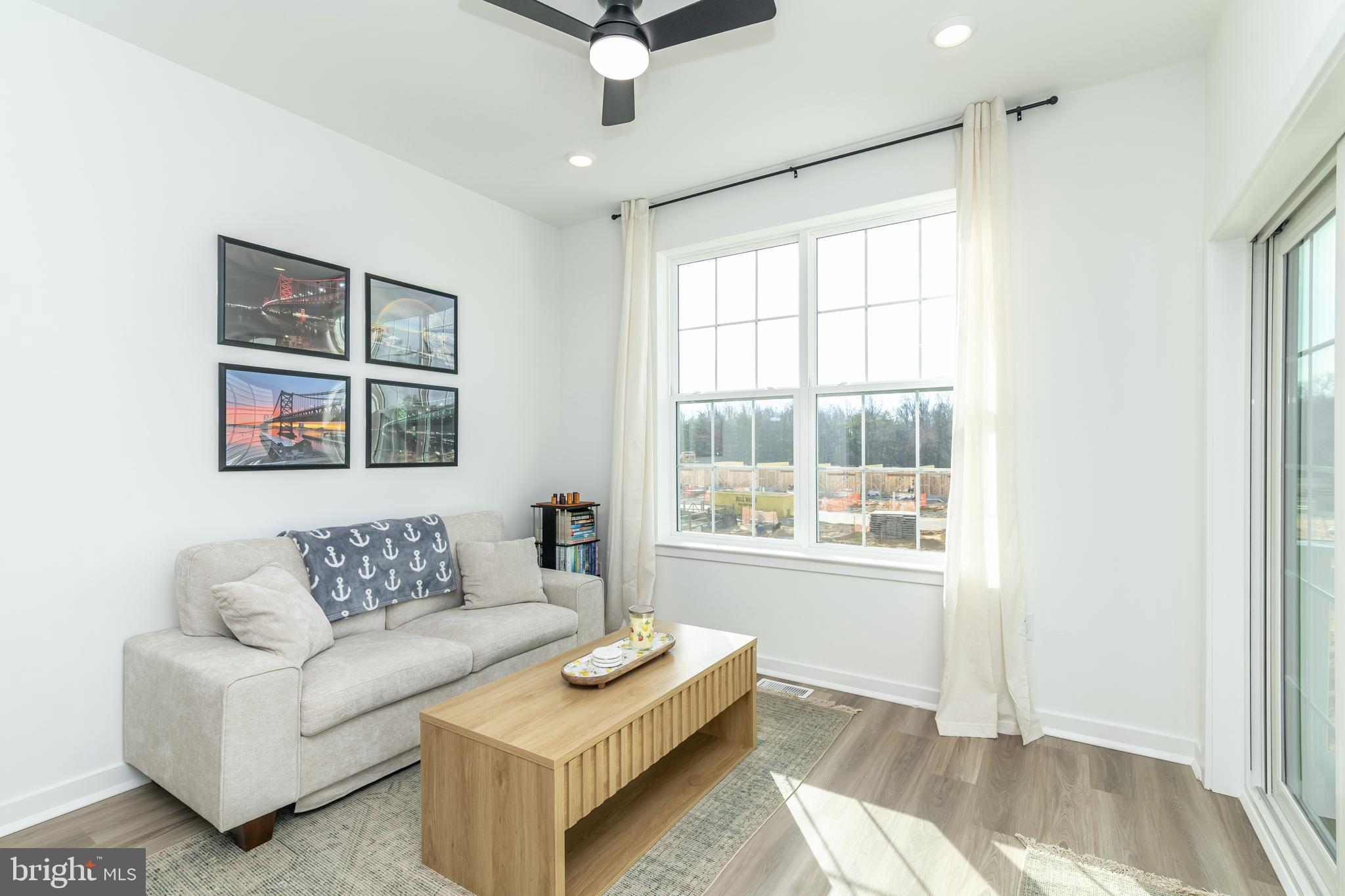 41 Barnes Way Sicklerville, NJ 08081 - Photo 12 of 46 a living room with furniture and a window