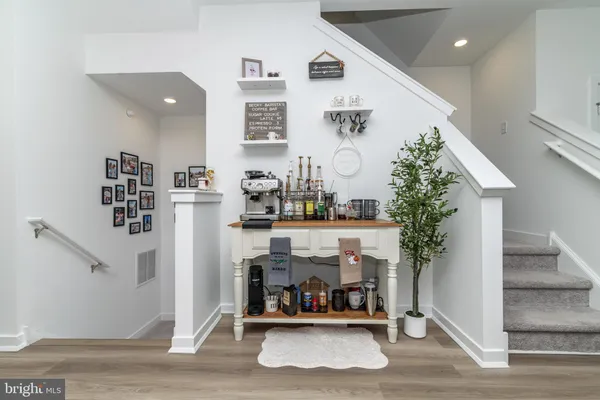 a living room with lots of furniture and decor