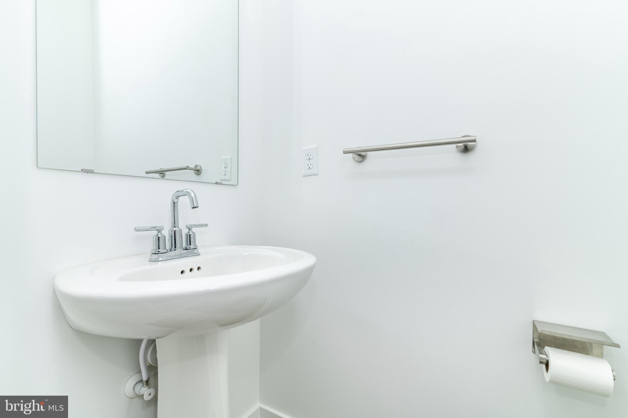 41 Barnes Way Sicklerville, NJ 08081 - Photo 26 of 46 a bathroom with a sink and a mirror