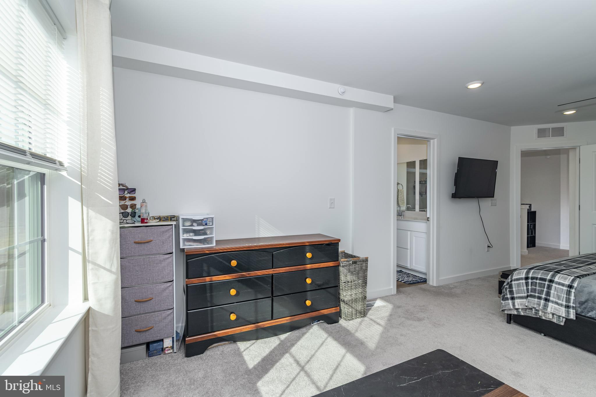 41 Barnes Way Sicklerville, NJ 08081 - Photo 33 of 46 a bedroom with a bed and television