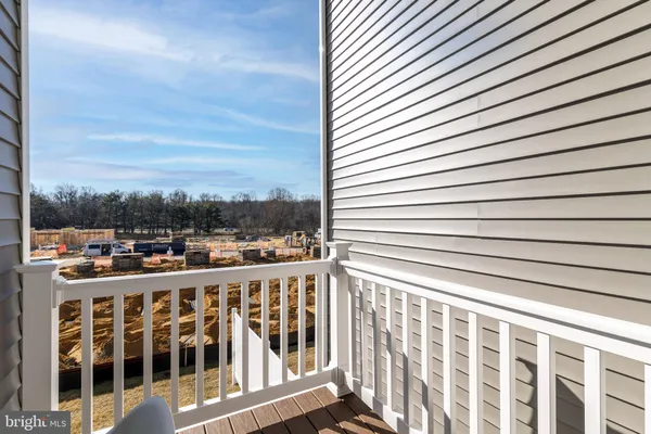 a view of a balcony with city view