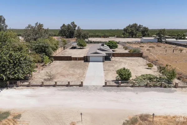 a view of a street with a house