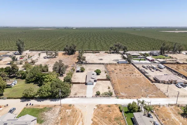 an aerial view of house with outdoor space