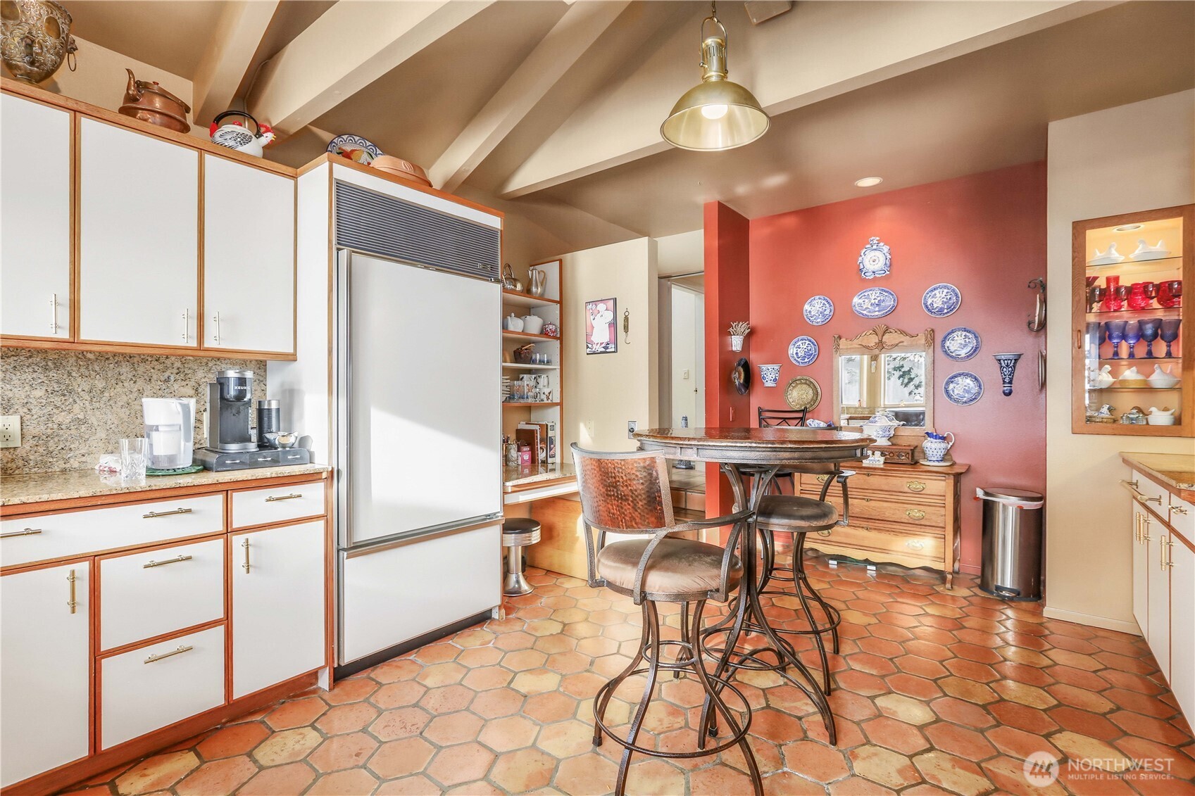 736 Tillamuk Drive La Conner, WA 98257 - Photo 13 of 34 a view of a dining room with furniture and chandelier