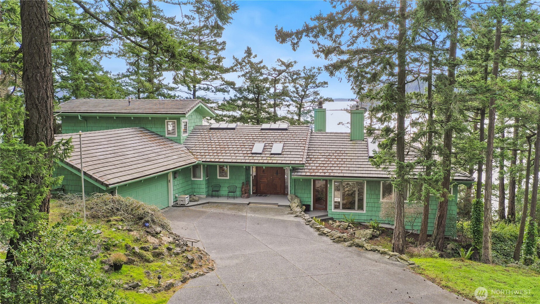 736 Tillamuk Drive La Conner, WA 98257 - Photo 2 of 34 front view of a house with a garden