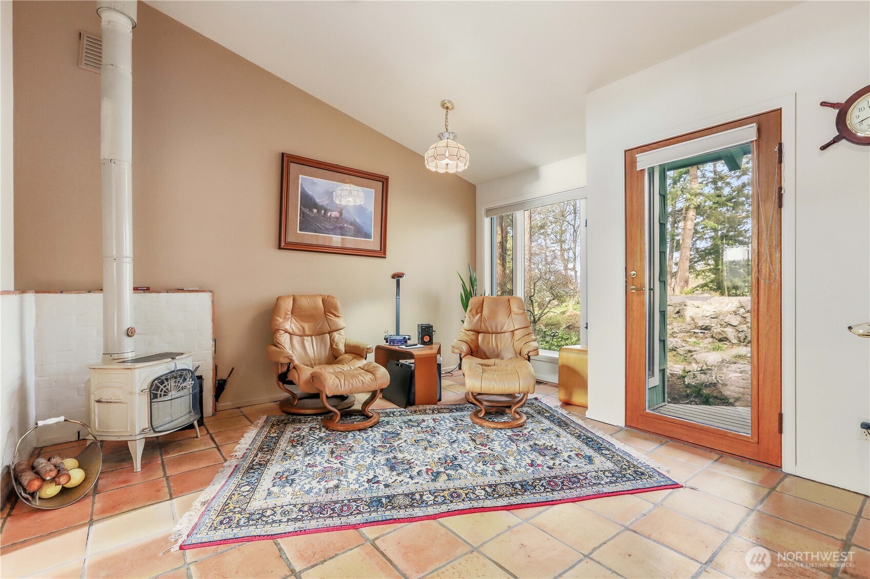 736 Tillamuk Drive La Conner, WA 98257 - Photo 21 of 34 a living room with furniture and a rug