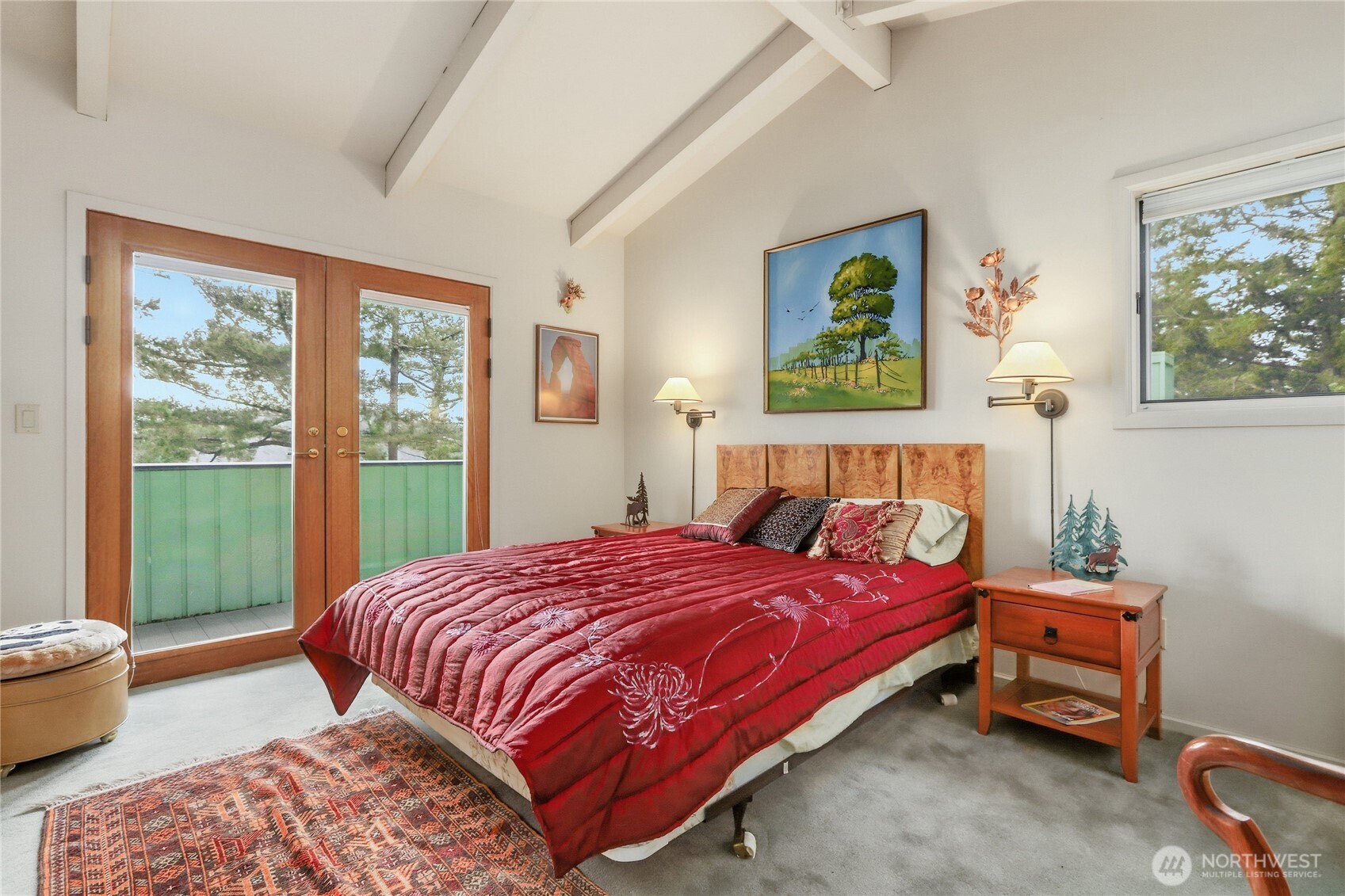 736 Tillamuk Drive La Conner, WA 98257 - Photo 28 of 34 a bedroom with a bed and a window