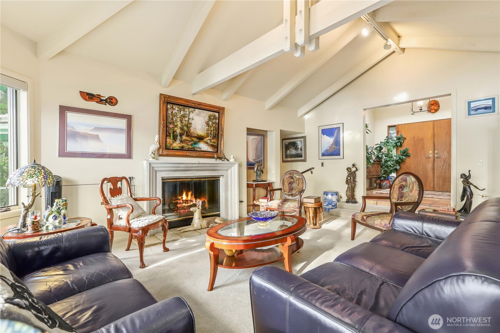 736 Tillamuk Drive La Conner, WA 98257 - Photo 5 of 34 a living room with furniture and a fireplace