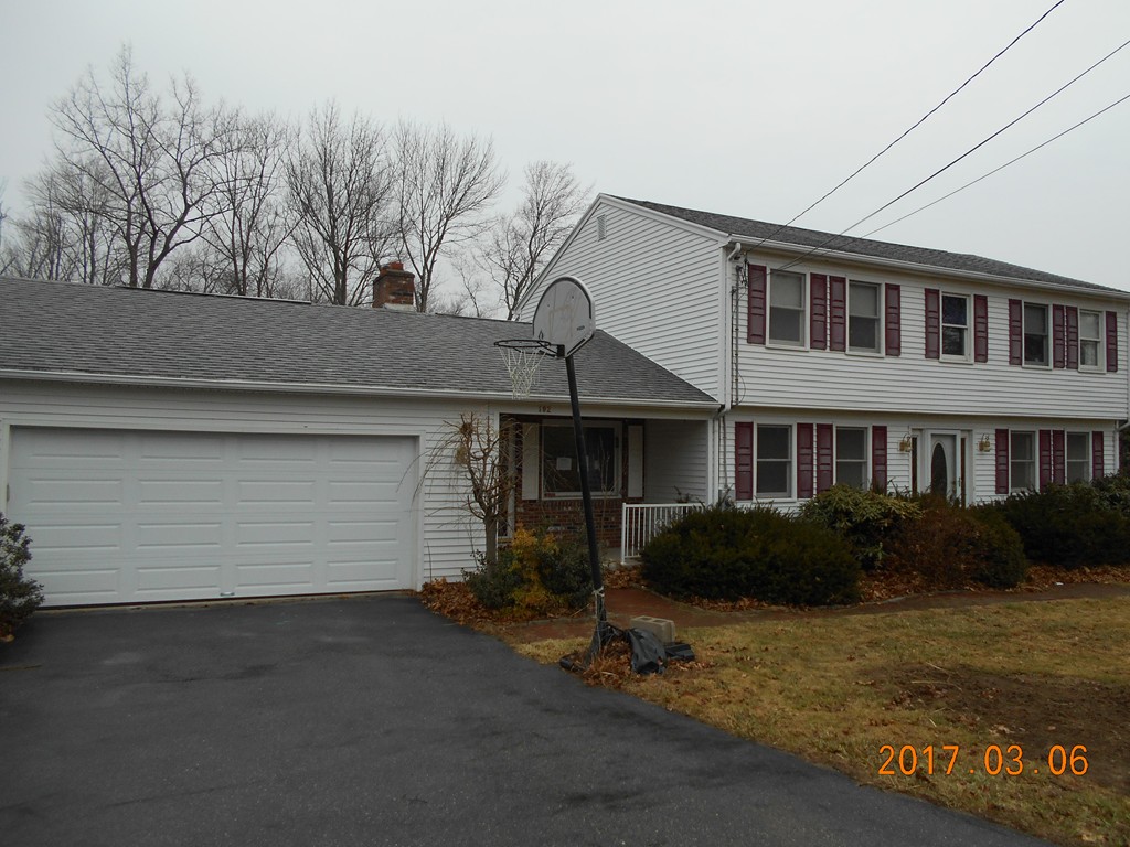 192 Bear Hole Road West Springfield, MA 01089 - Photo 1 of 9 a front view of a house with garden