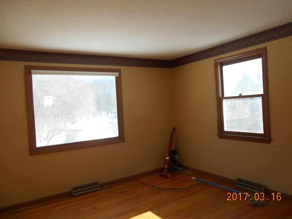 192 Bear Hole Road West Springfield, MA 01089 - Photo 2 of 9 an empty room with a window