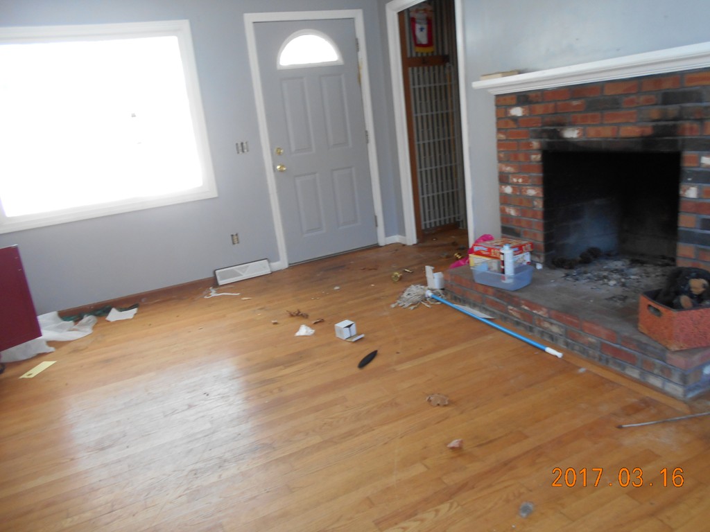 192 Bear Hole Road West Springfield, MA 01089 - Photo 8 of 9 a room with wooden floor and a fireplace
