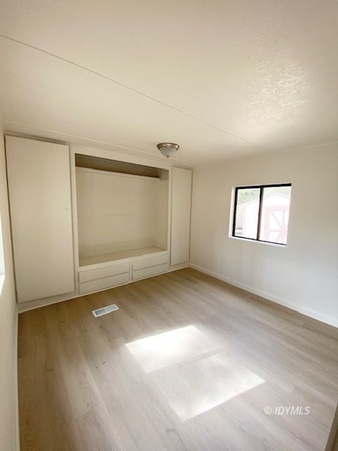 52791 Pine Cove Road Idyllwild, CA 92549 - Photo 5 of 8 an empty room with windows