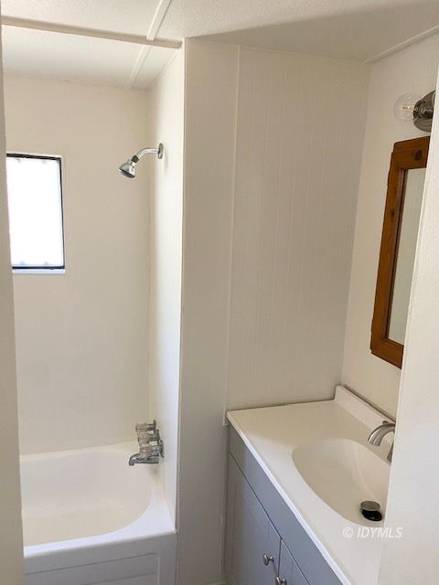 52791 Pine Cove Road Idyllwild, CA 92549 - Photo 8 of 8 a bathroom with a tub sink and vanity
