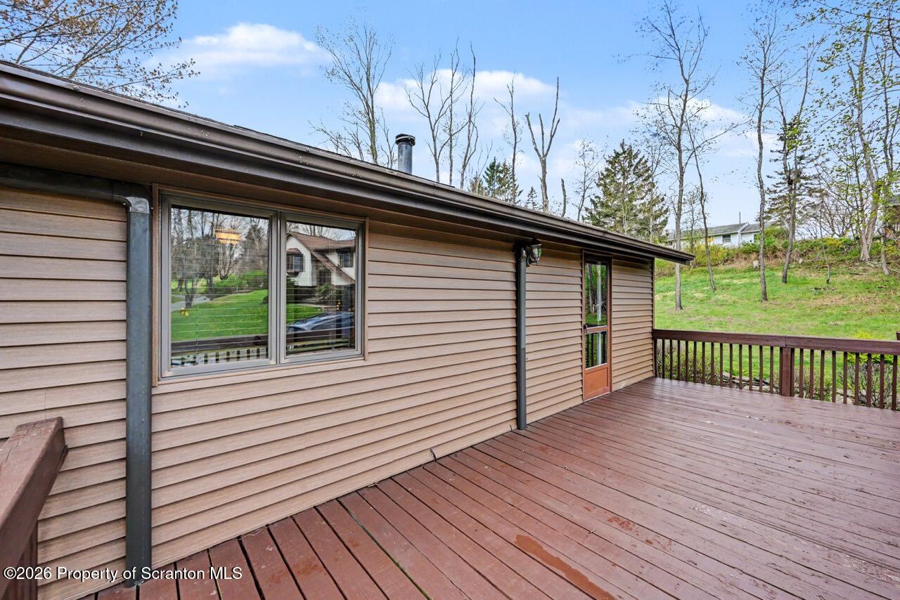 719 Scott Road Clarks Summit, PA 18411 - Photo 39 of 51 a view of backyard with a deck and wooden floor