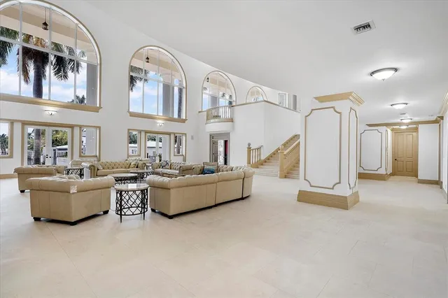 a kitchen with stainless steel appliances granite countertop a sink and cabinets