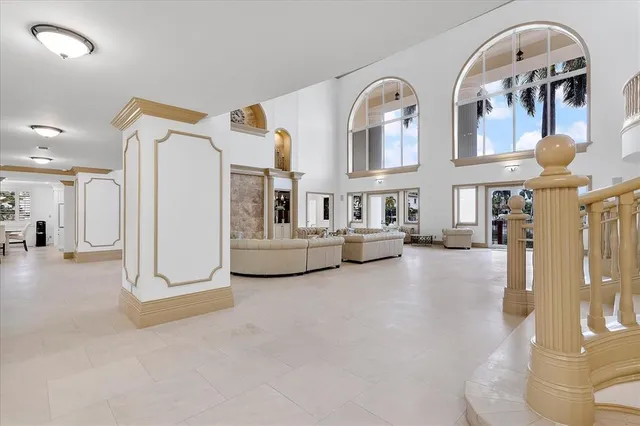 a kitchen with stainless steel appliances a stove a sink and a refrigerator