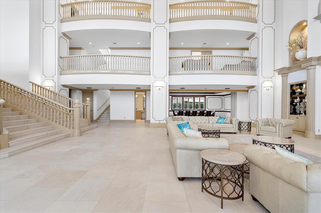 414 Riviera Isle Drive Fort Lauderdale, FL 33301 - Photo 16 of 70 a living room with fireplace furniture and a large window