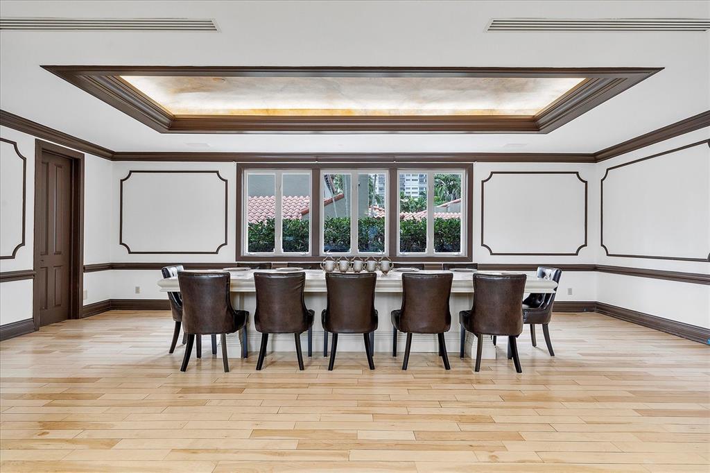 414 Riviera Isle Drive Fort Lauderdale, FL 33301 - Photo 18 of 70 a view of a dining room with furniture window and wooden floor