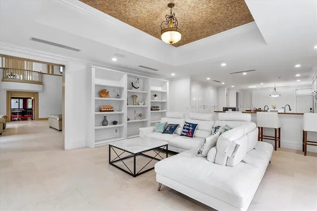 a view of a two chairs and table in a bedroom