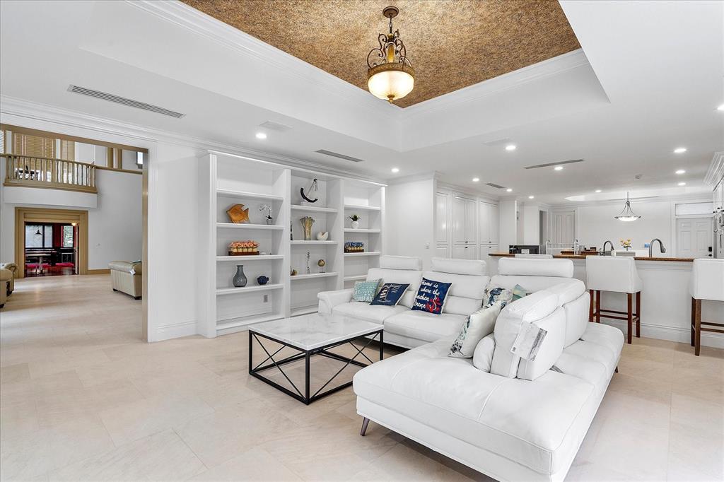 414 Riviera Isle Drive Fort Lauderdale, FL 33301 - Photo 20 of 70 a living room with furniture kitchen view and a chandelier