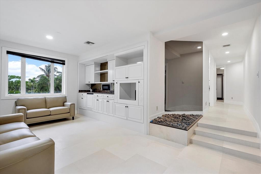 414 Riviera Isle Drive Fort Lauderdale, FL 33301 - Photo 30 of 70 a living room with furniture and a large window