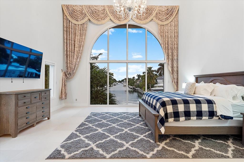 414 Riviera Isle Drive Fort Lauderdale, FL 33301 - Photo 31 of 70 a view of a two chairs and table in a bedroom