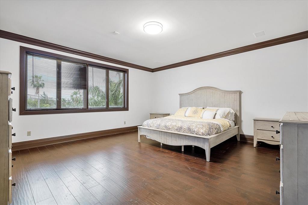 414 Riviera Isle Drive Fort Lauderdale, FL 33301 - Photo 35 of 70 a bedroom with a bed and window