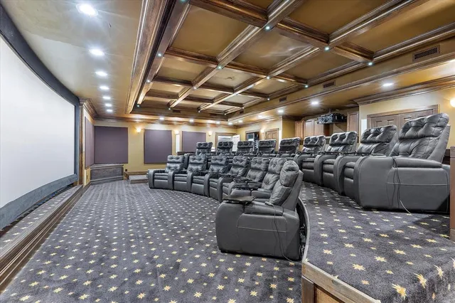 a swimming pool with outdoor seating and a potted plant