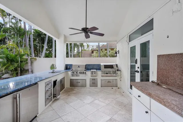 a front view of a house with a yard and a garage