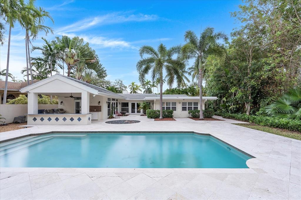 414 Riviera Isle Drive Fort Lauderdale, FL 33301 - Photo 48 of 70 a view of a house with pool and sitting area
