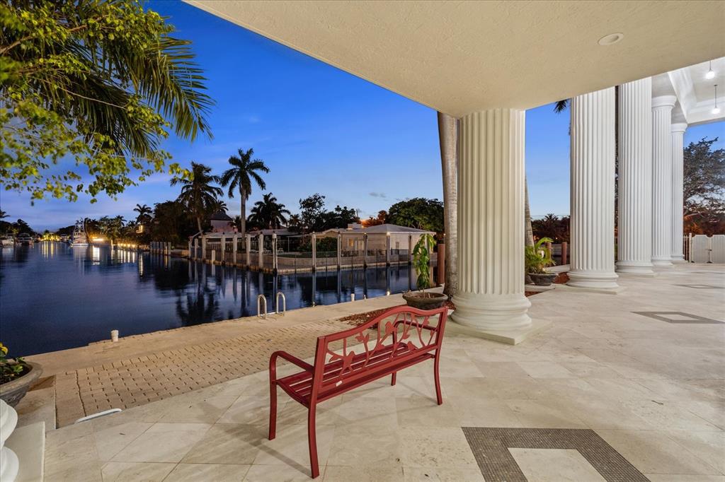 414 Riviera Isle Drive Fort Lauderdale, FL 33301 - Photo 54 of 70 a swimming pool with outdoor seating and a potted plant