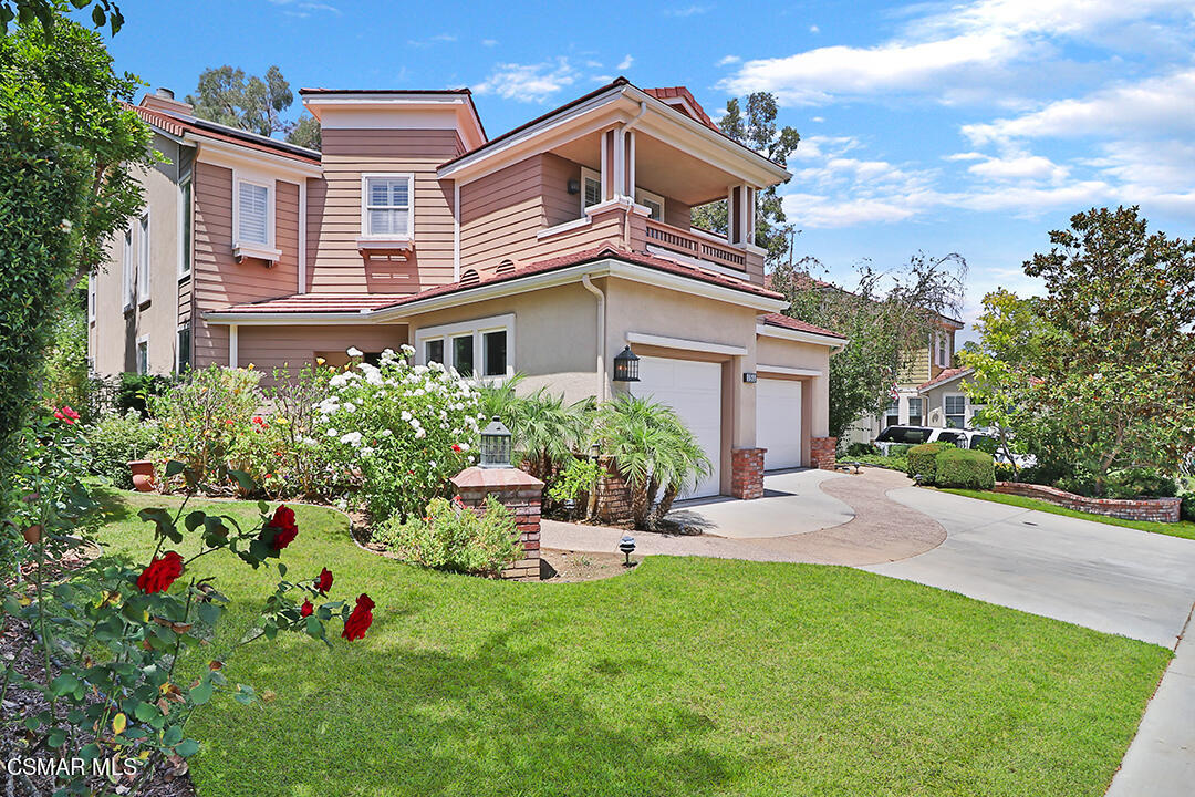 151 Brooks Road Simi Valley, CA 93065 - Photo 2 of 56 a front view of a house with a yard and porch