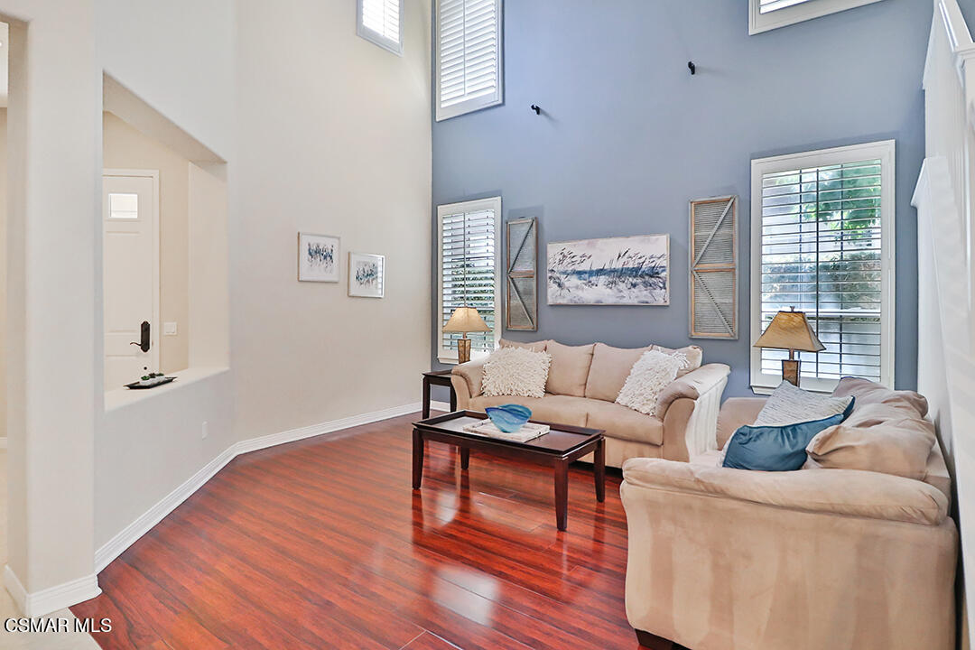151 Brooks Road Simi Valley, CA 93065 - Photo 11 of 56 a living room with furniture and a wooden floor