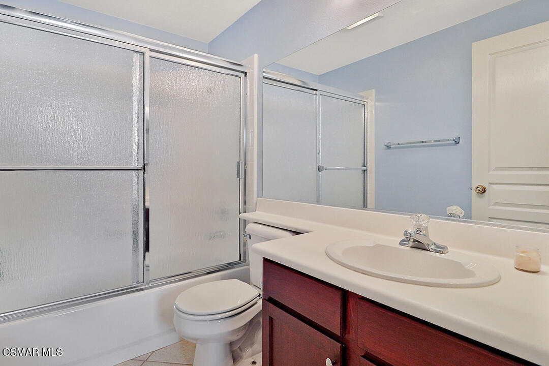 151 Brooks Road Simi Valley, CA 93065 - Photo 15 of 56 a bathroom with a sink toilet and shower