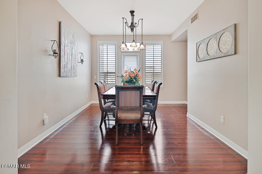 151 Brooks Road Simi Valley, CA 93065 - Photo 17 of 56 a view of a dining room with furniture window and wooden floor