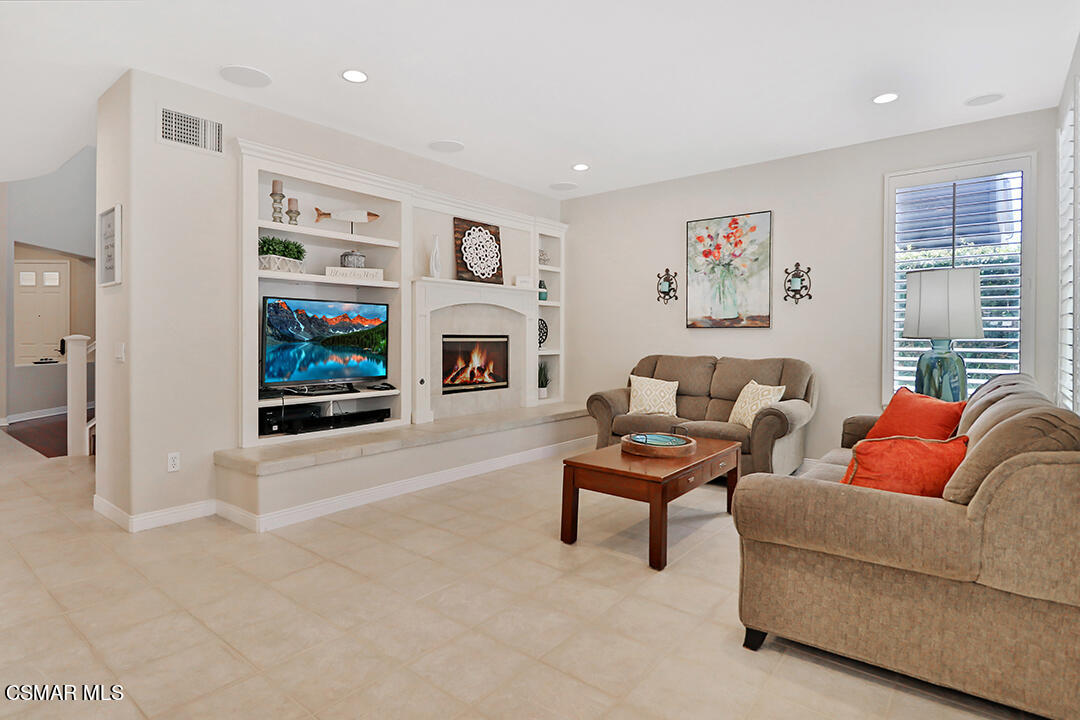 151 Brooks Road Simi Valley, CA 93065 - Photo 20 of 56 a living room with furniture and a fireplace